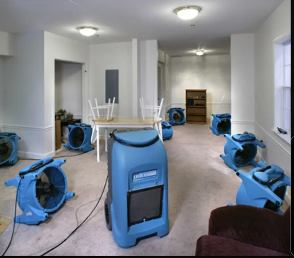 Air movers and dehumidifier setup for Water Damage Restoration in Redland